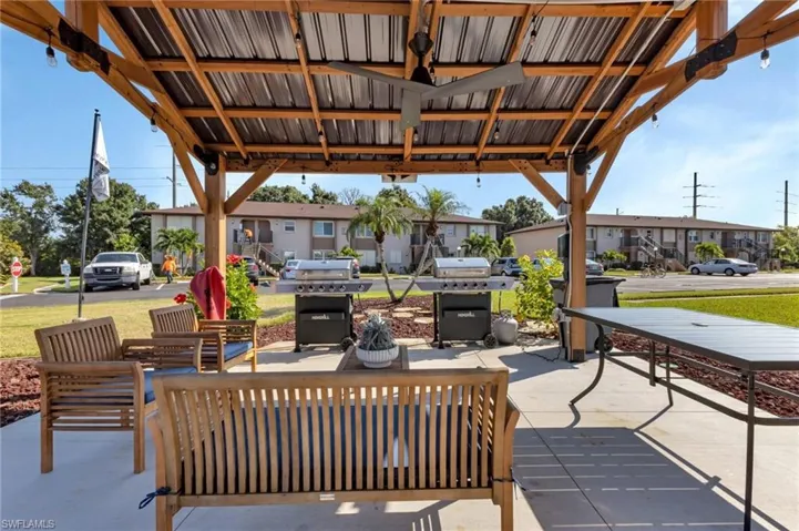 View of patio / terrace featuring a residential view and grilling area