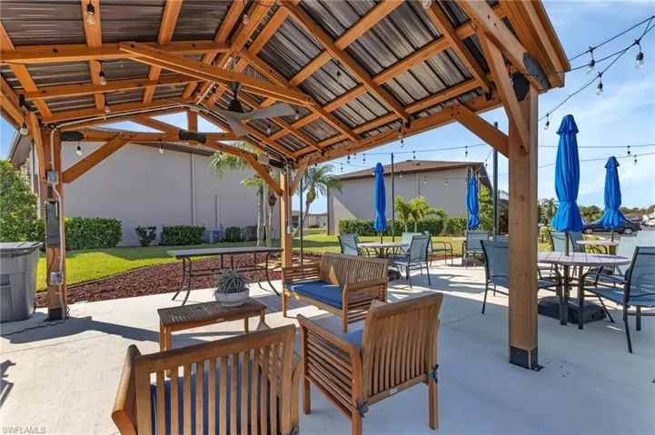 View of patio / terrace with outdoor dining area and a gazebo