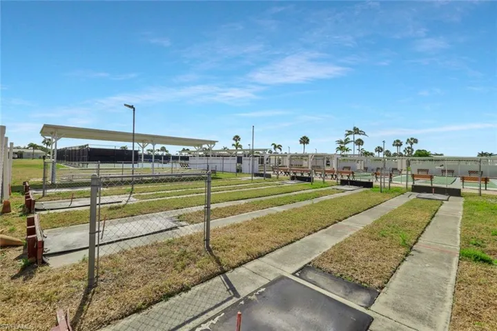 View of property's community with fence