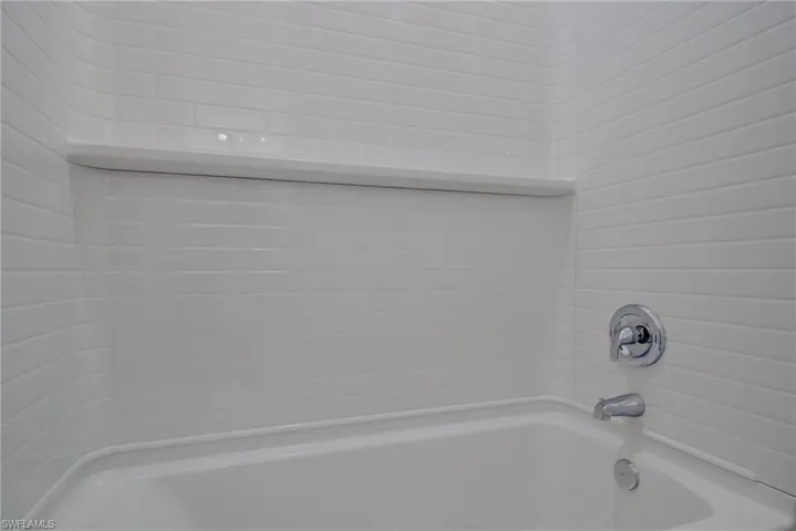 Bathroom featuring shower / bath combination