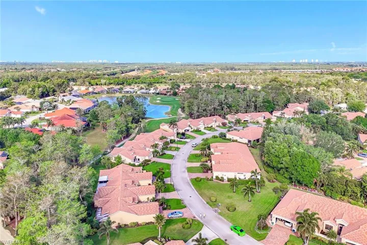 Aerial view featuring a residential view and a water view