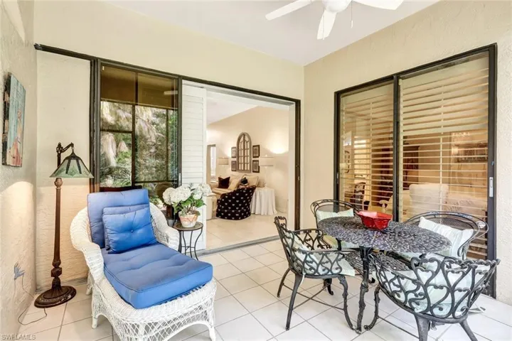 View of patio / terrace with outdoor dining area and a ceiling fan