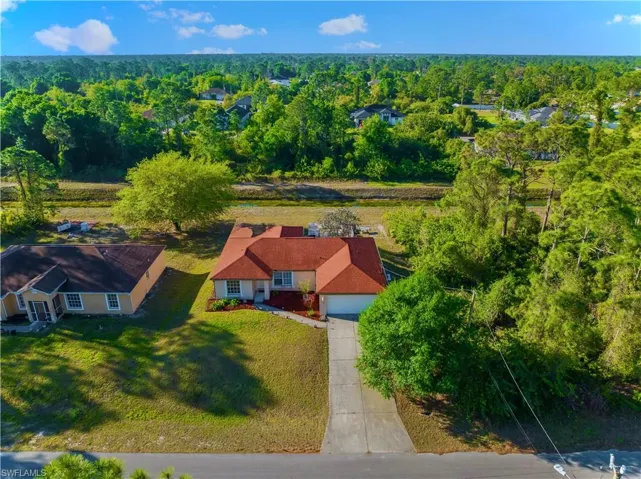 Drone / aerial view featuring a view of trees