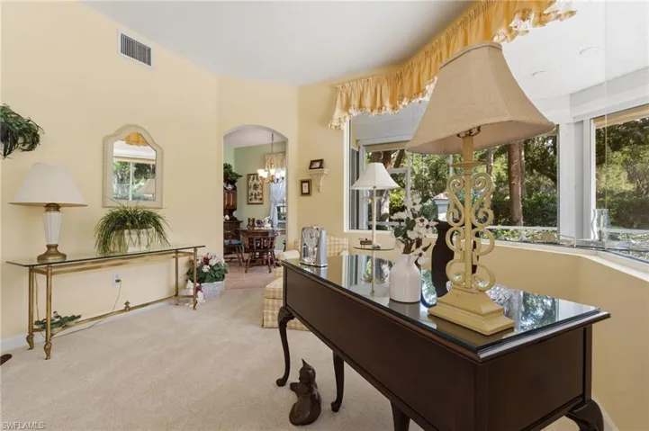 Living room is large enough to accomidate a desk  or piano