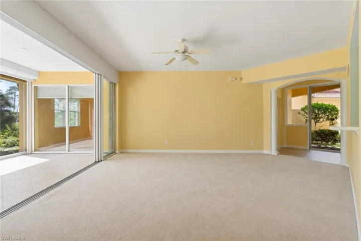 Large living room with sliders to lanai