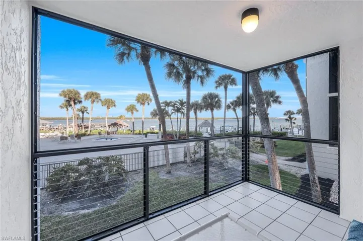 Unfurnished sunroom featuring a wealth of natural light