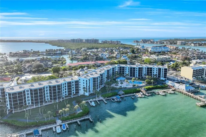 Drone / aerial view with a water view and a view of city