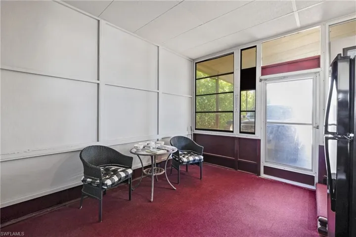 Living area featuring carpet