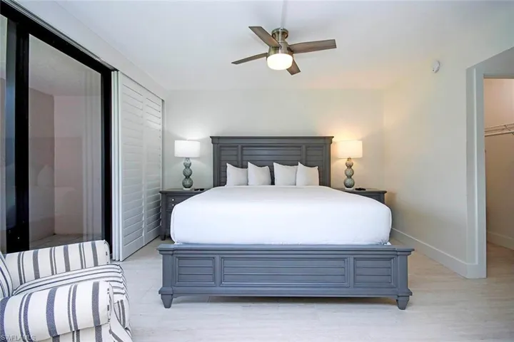 Bedroom featuring light wood finished floors and a ceiling fan