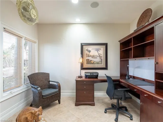 Home office featuring light tile patterned flooring