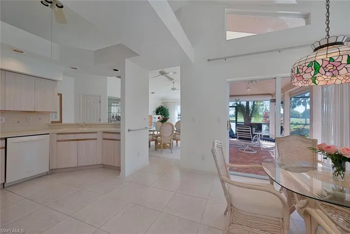 Tiled dining area with ceiling fan
