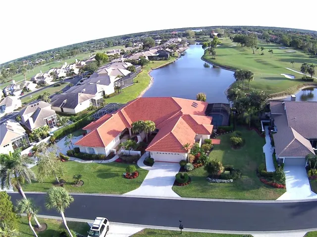 Bird's eye view featuring a water view and a residential view