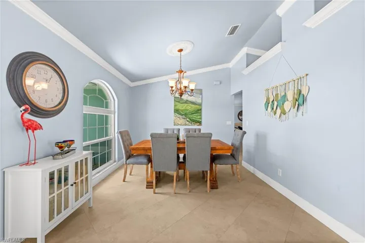 High ceilings and crown molding in the dining room