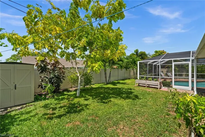 Mature tropical landscaping throughout the property