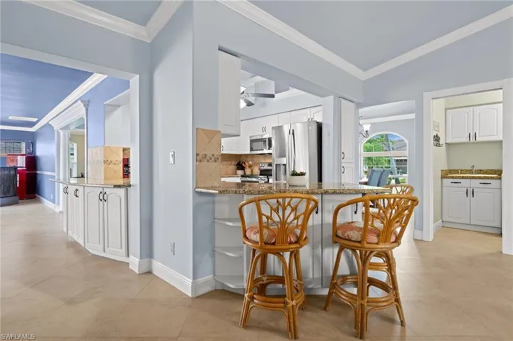 Breakfast bar and serving window in the kitchen