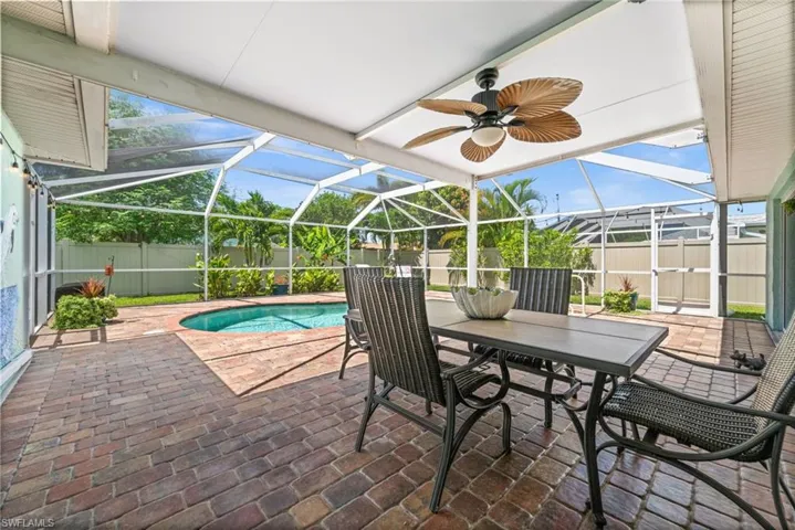 Covered lanai adjacent to the pool