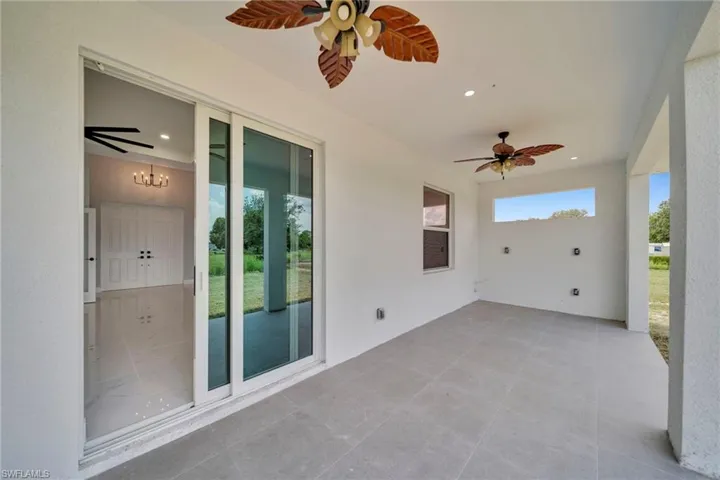 View of patio / terrace with ceiling fan