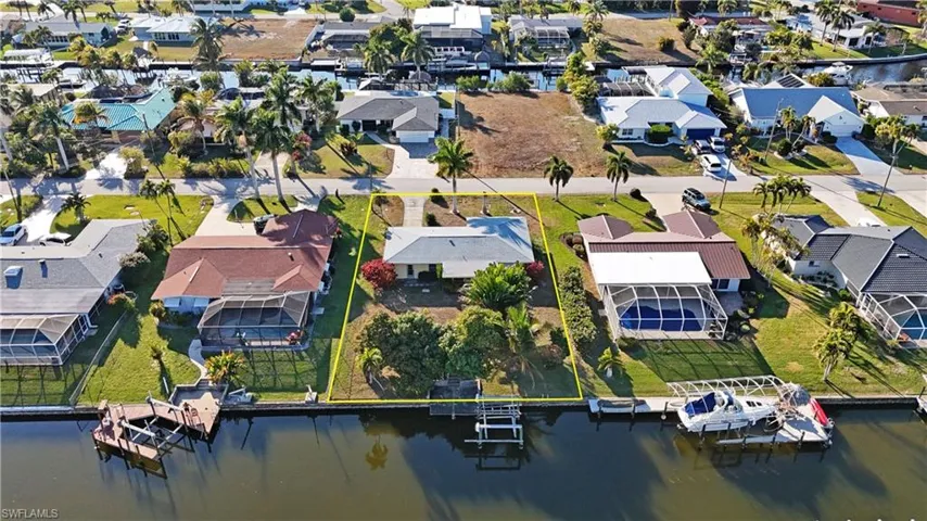 Aerial view of residential area with a large body of water