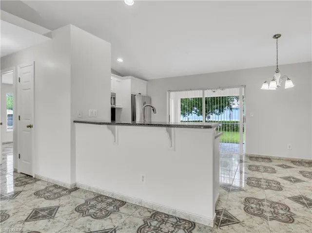 912 SE 5th  PL, Cape Coral, FL 33990