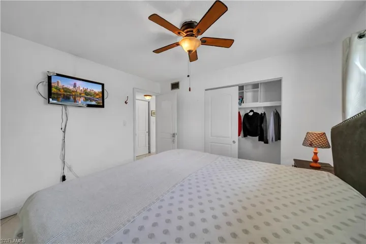 Bedroom featuring a closet and ceiling fan