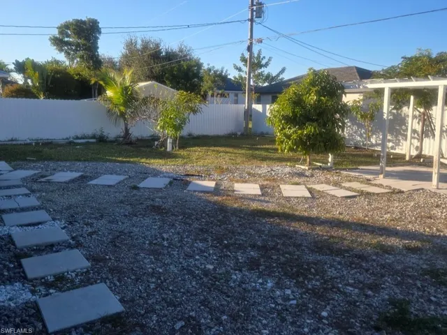 View of fenced backyard