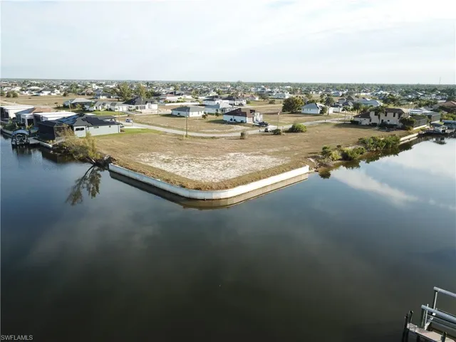 Aerial view of residential area with a nearby body of water