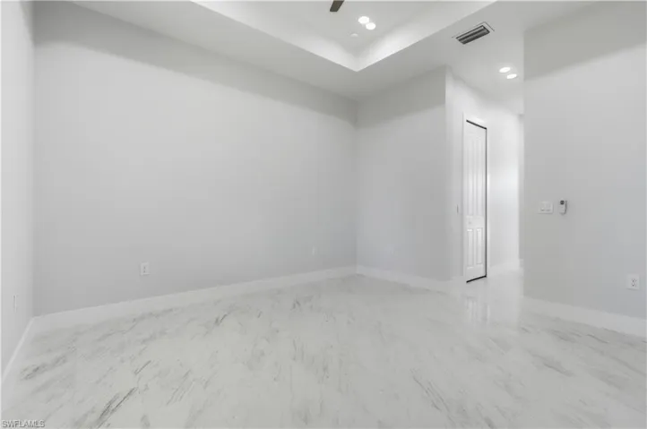 Unfurnished room with recessed lighting and ceiling fan