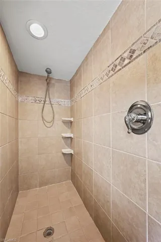 Bathroom with tiled shower