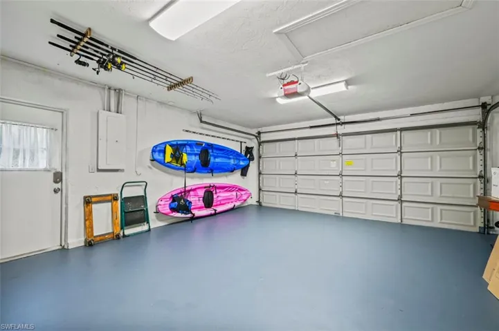 Garage featuring electric panel