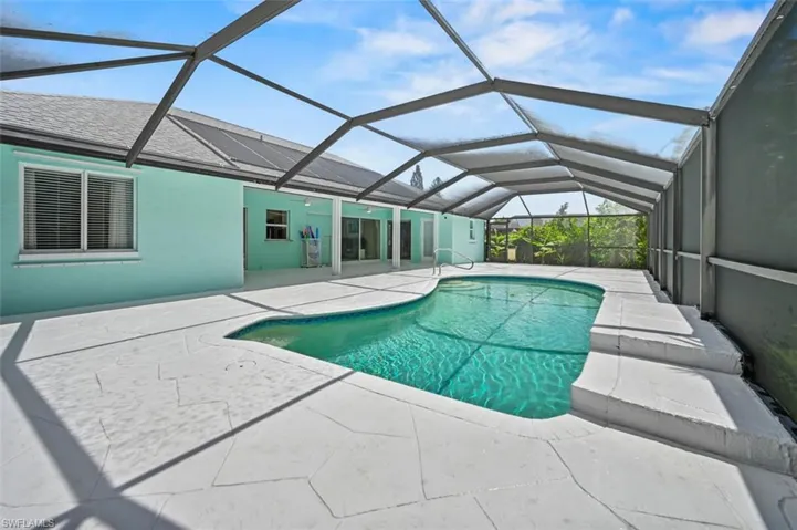 Swimming pool with a patio