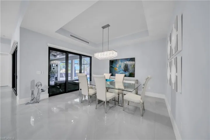 Recessed ceiling with a linear crystal chandelier