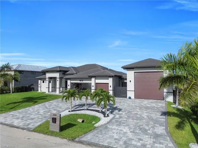 Contemporary architecture with a paver driveway