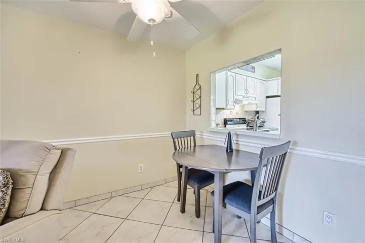 Dining area with ceiling fan