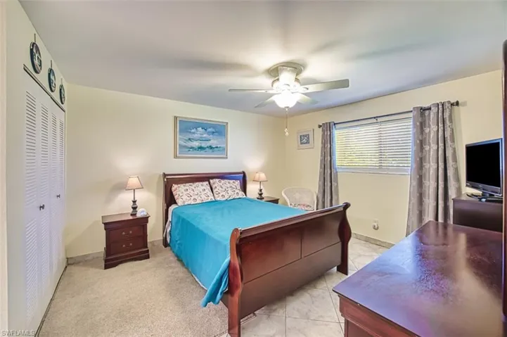 Bedroom with a closet, ceiling fan