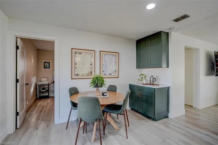 Dining room featuring light wood-type flooring