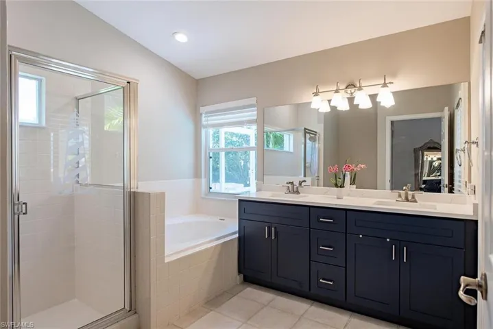 Owner's suite bathroom with new vanity