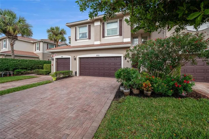Huge driveway with two car garage