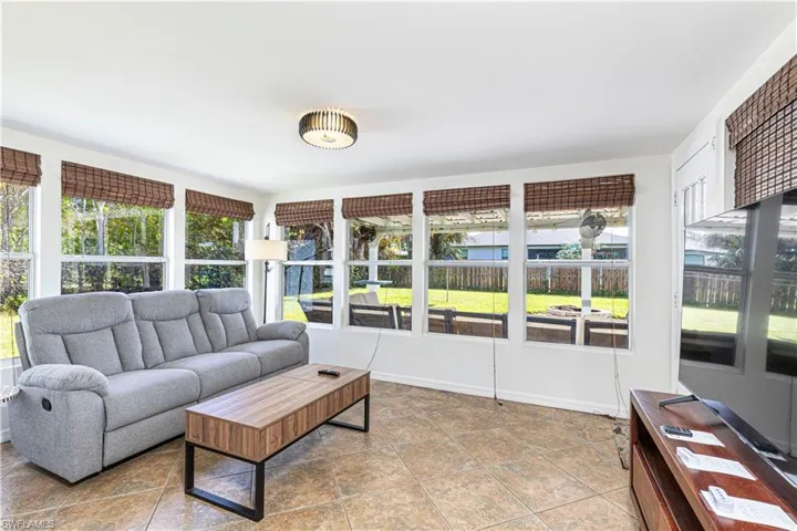 Sunroom featuring a wealth of natural light