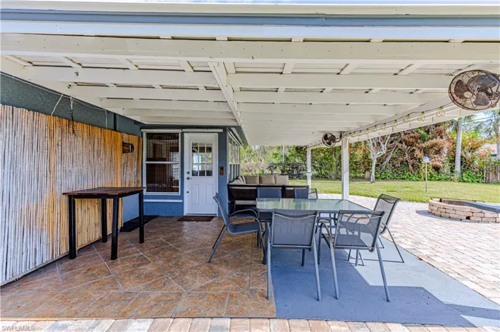 View of patio featuring a fire pit