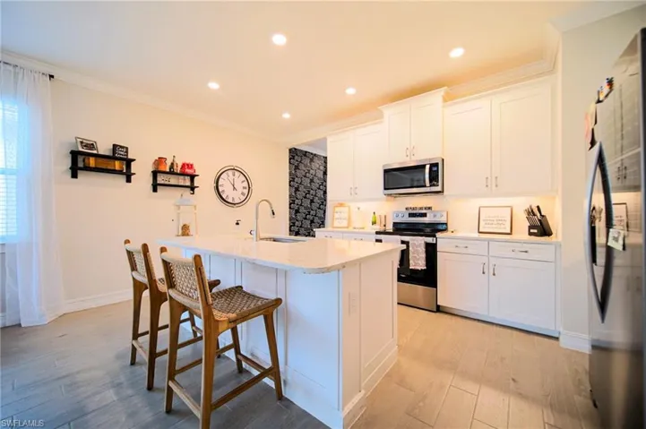 The Island Kitchen Comes With Granite Countertops, Tile Backsplash, Stainless Steel Appliances, 42 Inch White Shaker Uppers, Under Cabinet Lighting, And An Oversized Walk-In Pantry!