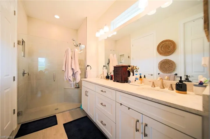 The Master Bathroom Has Dual Sinks, Granite Countertops, And An Enclosed Glass Walk-In Shower!