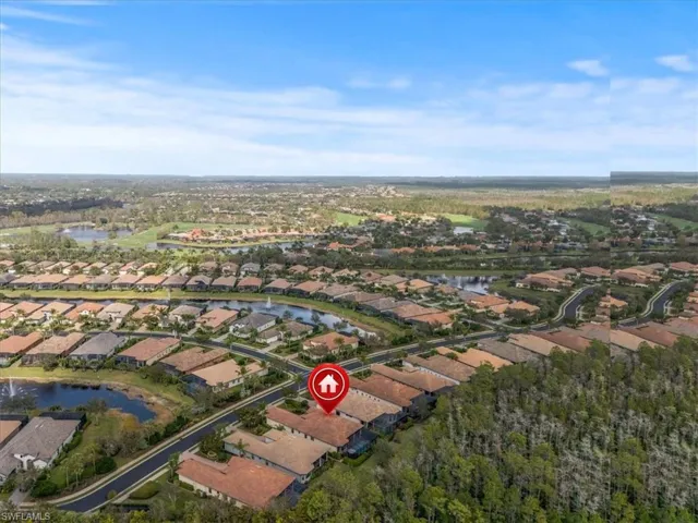 Aerial view with a water view and a residential view