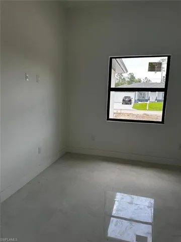 View of tiled spare room