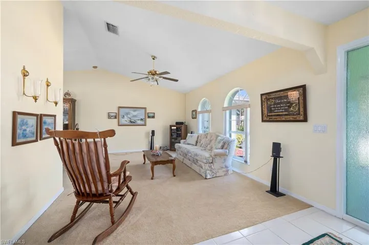 Dining Room leads to kitchen and step out to the extended sun room (Lanai).