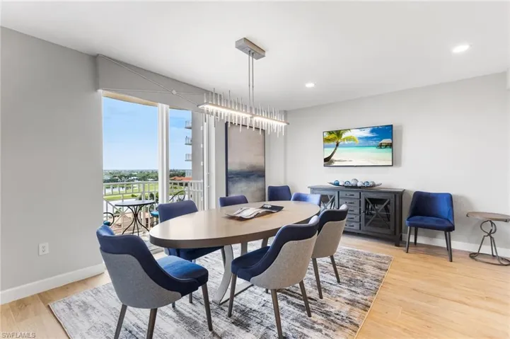Formal dining area with fantastic views of the golf course and lakes!