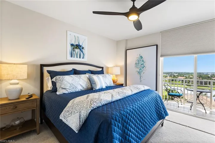 Nicely sized 2nd bedroom with a balcony overlooking the golf course and the lakes! This bedroom has an ensuite full bath.