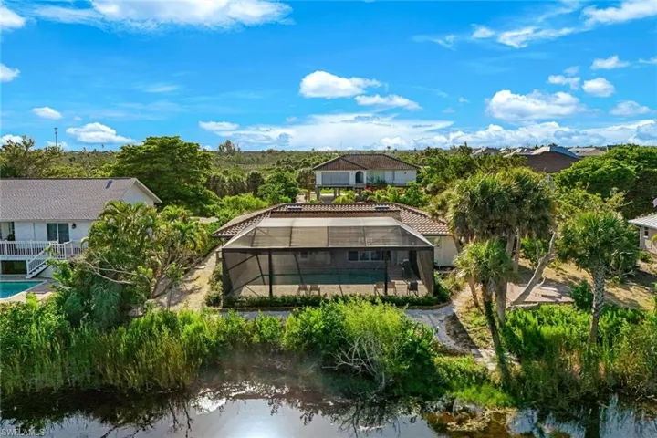 Aerial view of residential area with a large body of water