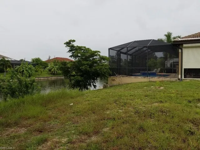 View of yard featuring a lanai