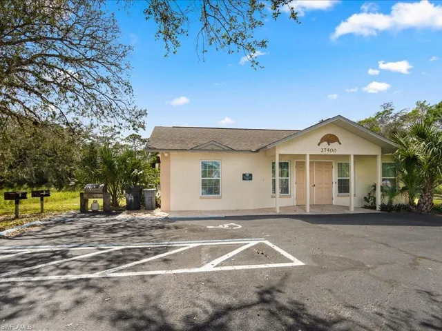 Community Pool house with BBQ picnic area