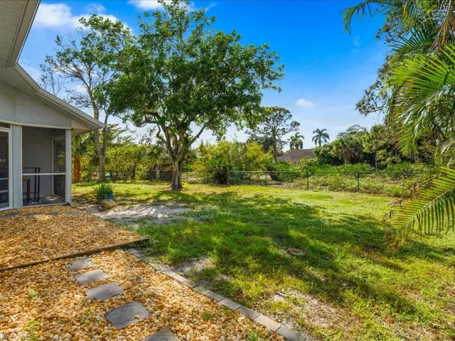 Fenced back yard perfect for pets and room for a pool!